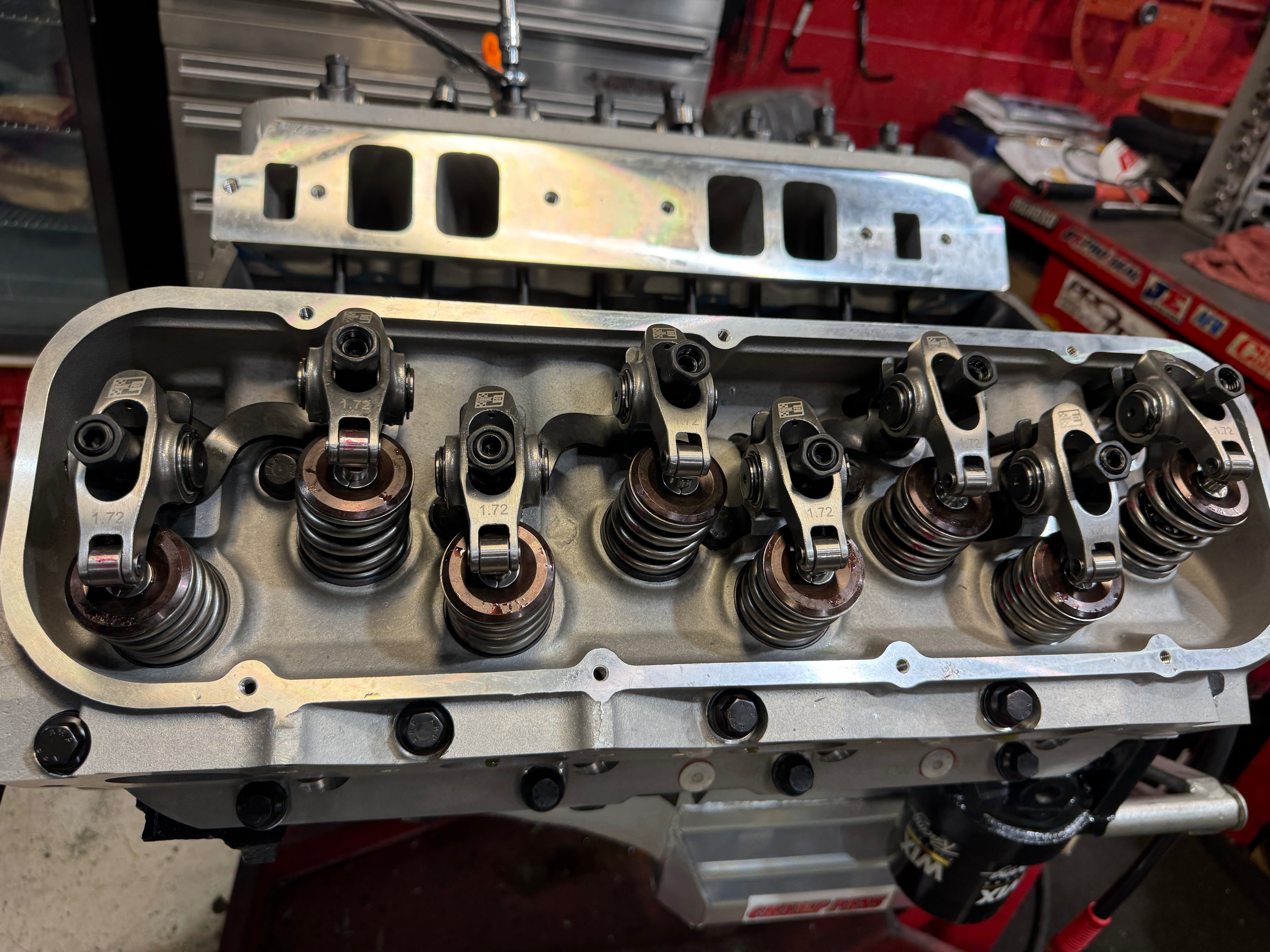 ARP cylinder head bolts installed in an engine block during assembly