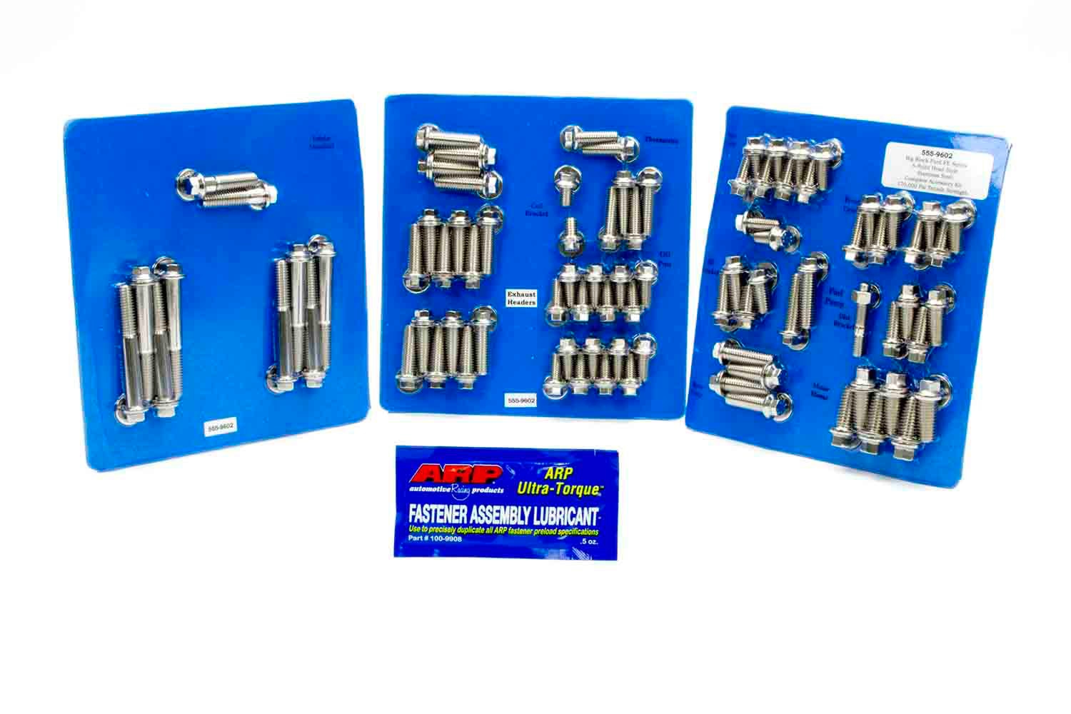 ARP engine fasteners including head studs, rod bolts, and main studs on a machine shop workbench